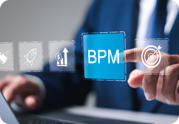 Close-up of a businessman’s hands interacting with a digital interface on a laptop, featuring a blue 'BPM' icon surrounded by business-related symbols like a handshake, rocket, dollar sign, and target, symbolizing business process management and innovation